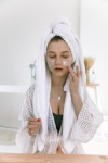 Esthetician performing a treatment  facial. Facial spa Miami Lakes